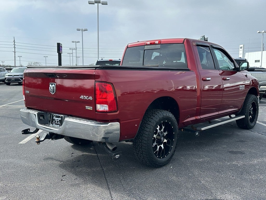 2015 RAM 1500 4WD Quad Cab 140.5" SLT