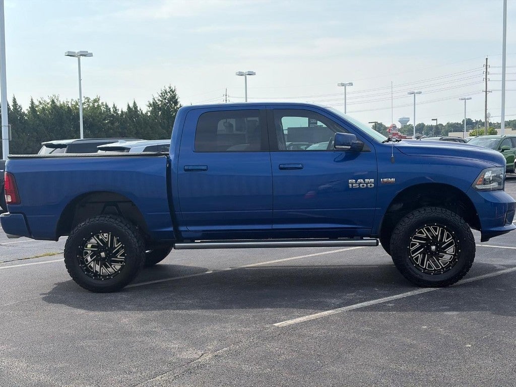 2016 RAM 1500 4WD Crew Cab 140.5" Sport